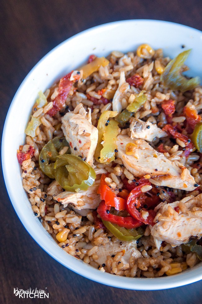 Quick and easy spanish rice bowls using grilled chicken, banana peppers, sundried tomatoes and Seeds of Change Spanish Rice.