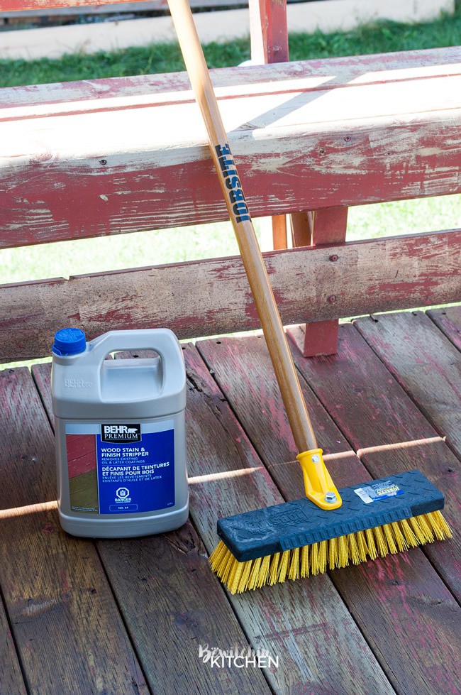 How to stain a deck in 4 easy steps. This DIY deck renovation uses Behr's Premium Deck Stripper, Wood Cleaner and Semi-Transparent Stain in Redwood Naturaltone. The before and after looks incredible!