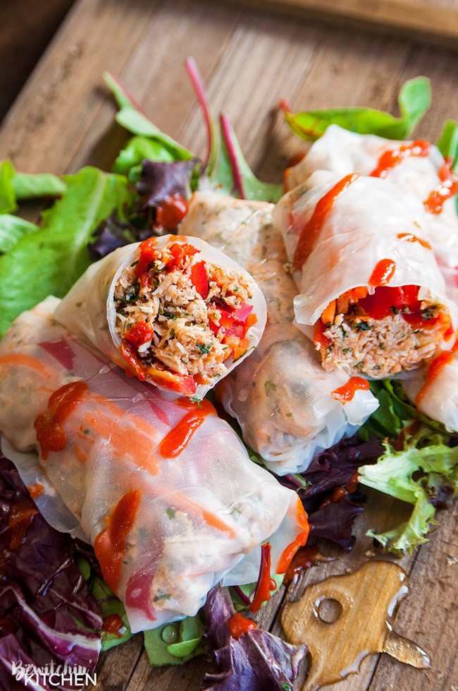 Honey Sriracha Chicken Spring Rolls - this slow cooker dinner recipe uses rice paper wrappers and is not only gluten free but paleo and 21 day fix approved as well. | TheBewitchinKitchen.com