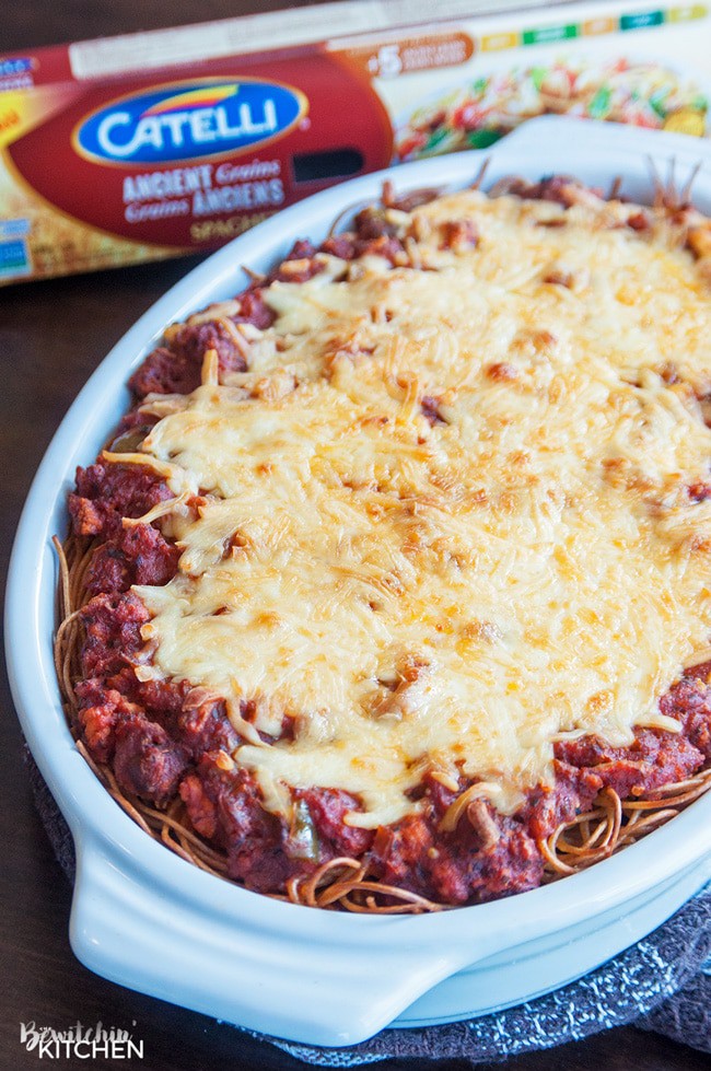 This skinny baked spaghetti recipe is a lightened up version of a classic spaghetti casserole. Both healthy and hearty, this wholesome dinner recipe favorite uses ancient grain pasta and the best spaghetti sauce ever. This sauce has tons of vegetables, light cheese (part skim mozzarella), and both ground turkey and turkey Italian sausage. A healthy baked spaghetti recipe is within reach, add it to your meal plan!