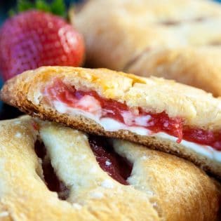 Strawberry Rhubarb Hand Pies. These cream cheese filled strawberry rhubarb turnovers only have three ingredients. Super easy dessert recipe!