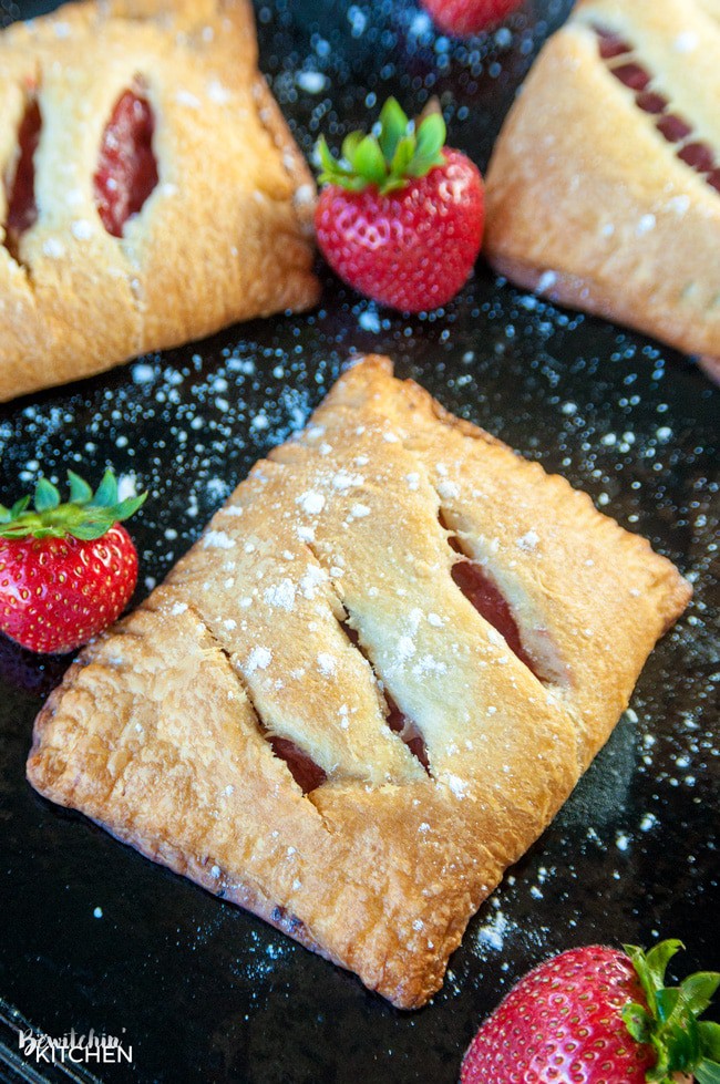 Strawberry Rhubarb Hand Pies. These cream cheese filled strawberry rhubarb turnovers only have three ingredients. Super easy dessert recipe!