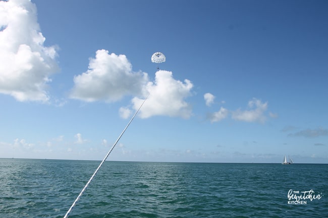 Parasailing in Key West Florida with Fury Water Adventures. This is a travel bucket list item and I was able to cross it off my 30 before 30. Best of all I had the beautiful view of the Florida Keys!