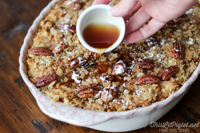 pouring maple syrup over a dish of pumpkin spice french toast