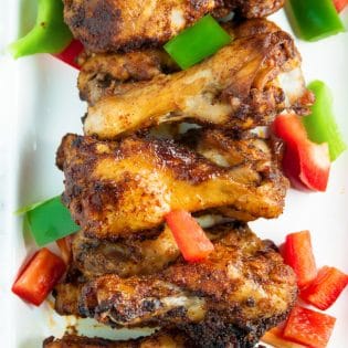 Fajita Chicken Wings - a southwestern twist on hot wings with a bite of lime. Whole 30 appetizer that also makes a great paleo dinner recipe.