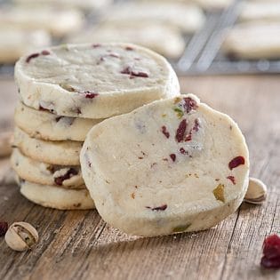 These Brown Butter Cranberry Pistachio Icebox cookies are a breeze to make for any dessert table! Buttery, rich and loaded with cranberries and pistachios!