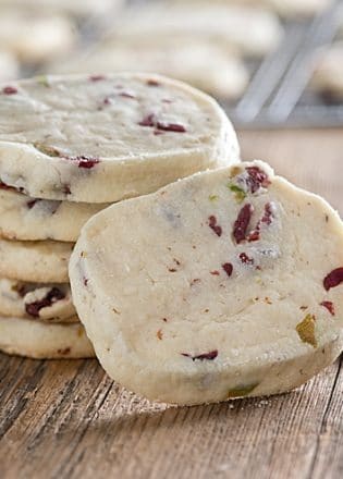 These Brown Butter Cranberry Pistachio Icebox cookies are a breeze to make for any dessert table! Buttery, rich and loaded with cranberries and pistachios!