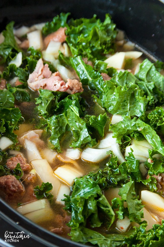 closeup: crockpot zuppa toscana in a crockpot before cooking