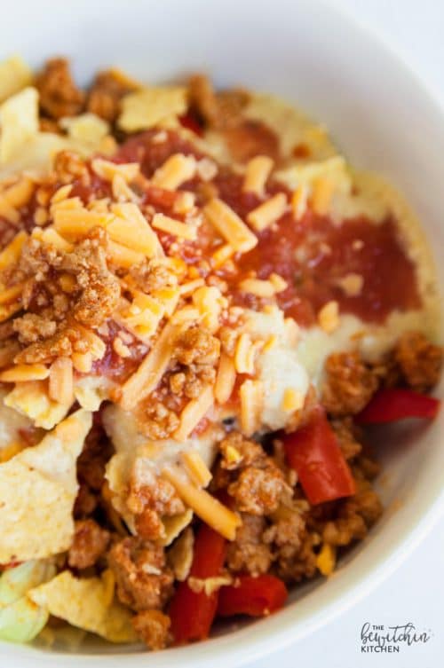 Turkey Taco Bowl with Spicy Avocado Dressing - an easy recipe to use up leftover tacos! They're simple to put together and are a healthy lunch idea PLUS a yummy dinner.