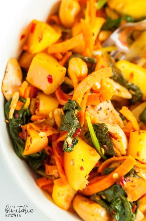 Spicy Chicken and Apple Sweet Potato Stir Fry recipe - a clean eating meal idea that's whole30 compliant and paleo approved. Makes a quick lunch or an easy healthy dinner.