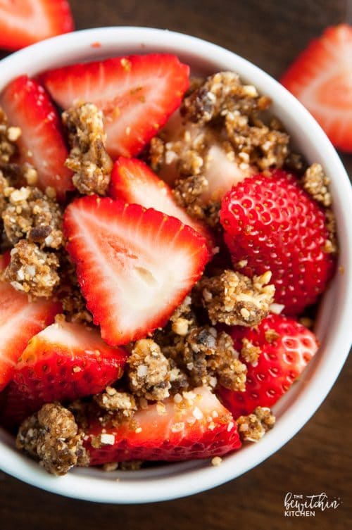 Whole30 dessert idea! Strawberries with coconut cashew crumble - it's so darn yummy. A healthy dessert that's paleo, no bake, and (with only four ingredients) easy to make.