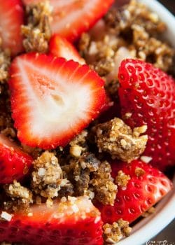 Whole30 dessert idea! Strawberries with coconut cashew crumble - it's so darn yummy. A healthy dessert that's paleo, no bake, and (with only four ingredients) easy to make.