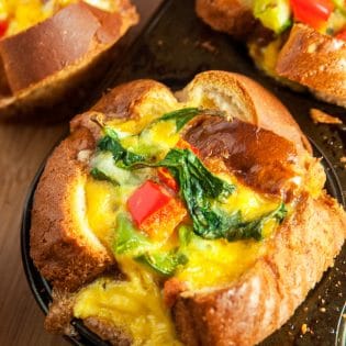 Simple and easy Frittata Cups. This healthy breakfast recipe has eggs, bell peppers, spinach, and cheese all in a breakfast cup shell of bread baked in a muffin tin. 21 Day Fix containers in post.