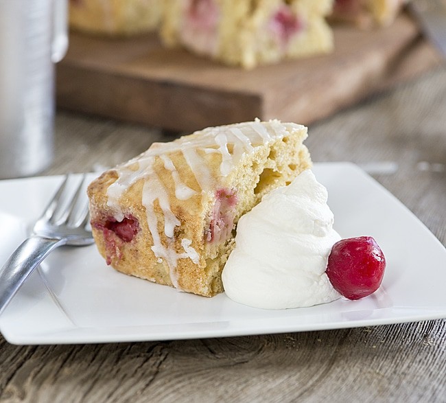 Cherry Oat Breakfast Cake recipe. Cake for breakfast? Yes! This is an easy recipe for a slightly sweet breakfast cake full of wholesome oats, fresh or frozen fruit and finished with a simple glaze.