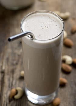 Making homemade nut milk is so simple! Follow this easy tutorial to make your own Almond Cashew Milk at home! Save this healthy recipe that's also dairy free and whole30 approved!