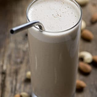 Making homemade nut milk is so simple! Follow this easy tutorial to make your own Almond Cashew Milk at home! Save this healthy recipe that's also dairy free and whole30 approved!