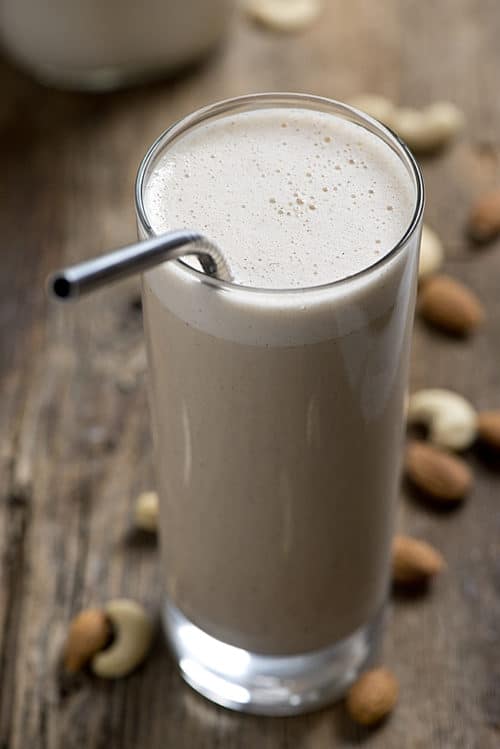 Making homemade nut milk is so simple! Follow this easy tutorial to make your own Almond Cashew Milk at home! Save this healthy recipe that's also dairy free and whole30 approved!