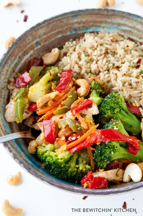 This healthy chicken stir fry takes a few minutes to make and is loaded with ingredients that are Whole30 and Keto Diet compliant (when you get rid of the rice). It's a quick and easy clean eating recipe.