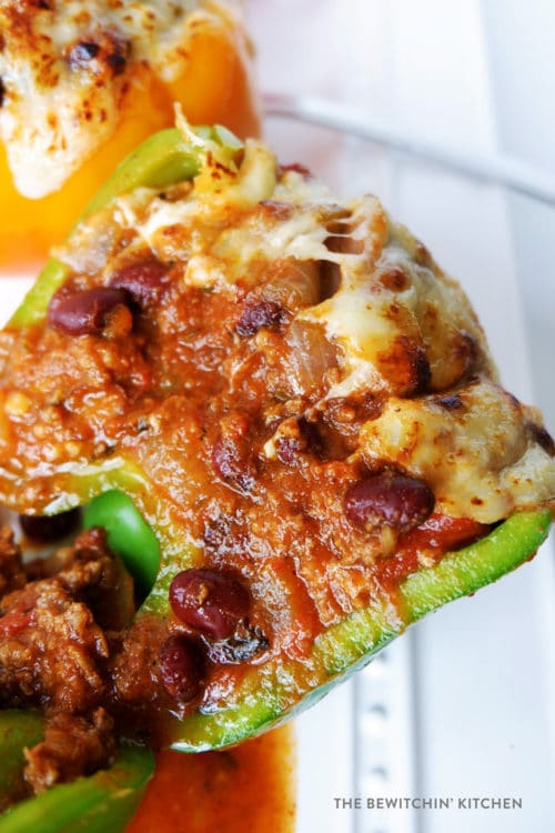 Healthy Chili Stuffed Peppers with Monterey Jack Jalapeno Cheese. Talk about comfort food! This family dinner recipe is easy to throw together, especially with leftover chili!