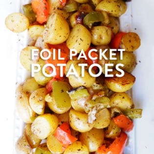 Classic and easy foil packet potatoes. This healthy grilling recipe uses potatoes, herbs, garlic, and bell peppers.