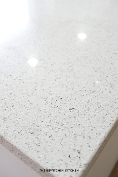 Stellar Snow by Silestone. These are beautiful white quartz countertops with glitter in them!
