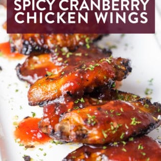 These spicy cranberry chicken wings are the perfect appetizer for Christmas parties, game days, and easy weeknight dinners. They're sweet, spicy, and easy to throw together at the last minute!