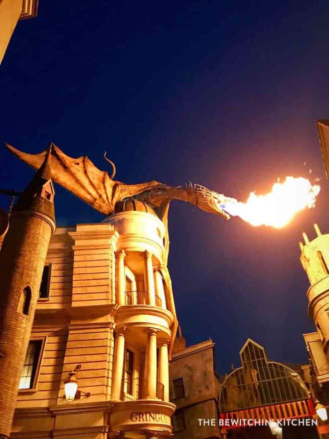 Dragon breathing fire over Gringotts bank at Universal Orlando Resort