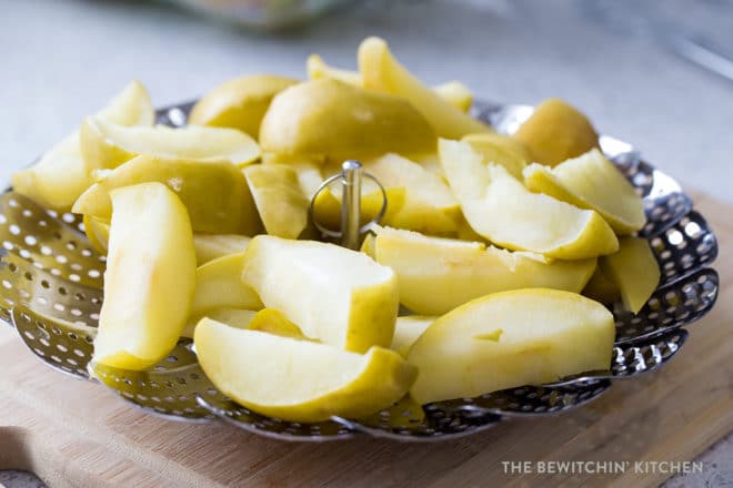 Steamed apples on a steamer basket