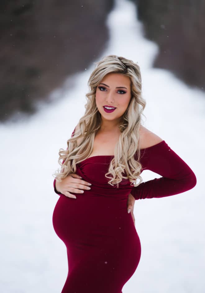 Winter maternity session in red dress from kc mae