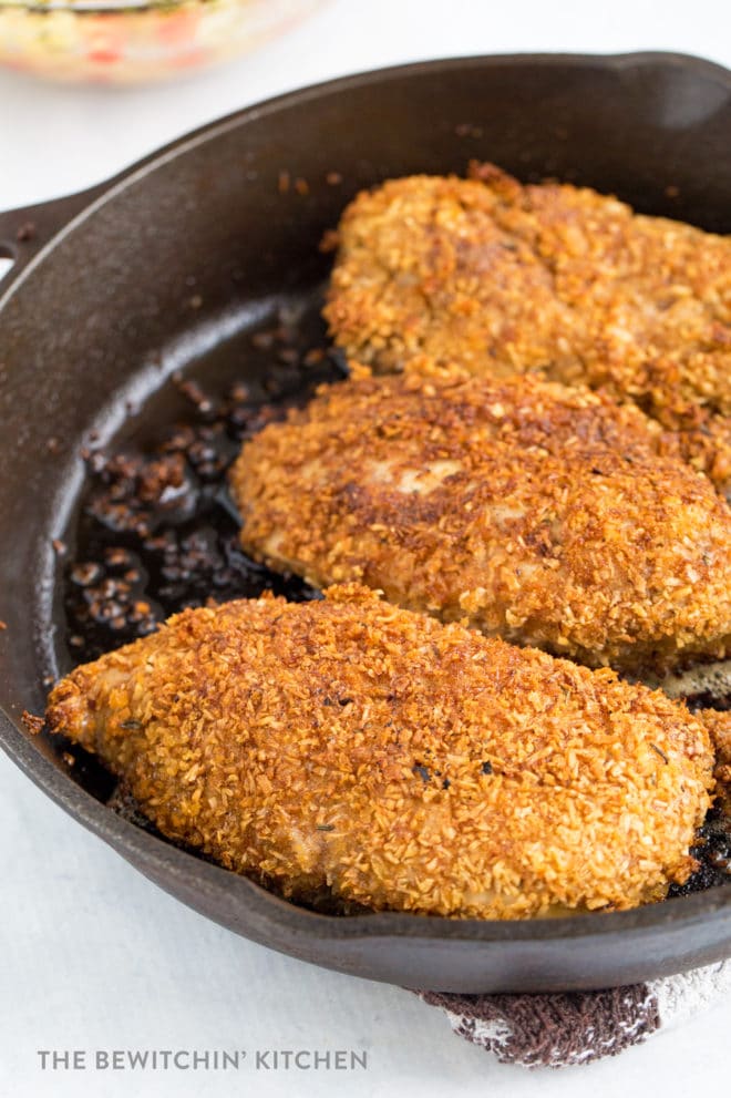 Coconut Crusted Chicken in a cast iron Pan