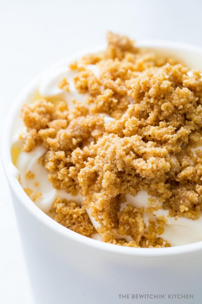 Close up shot of homemade key lime pie ice cream with a graham cracker crumble on top.