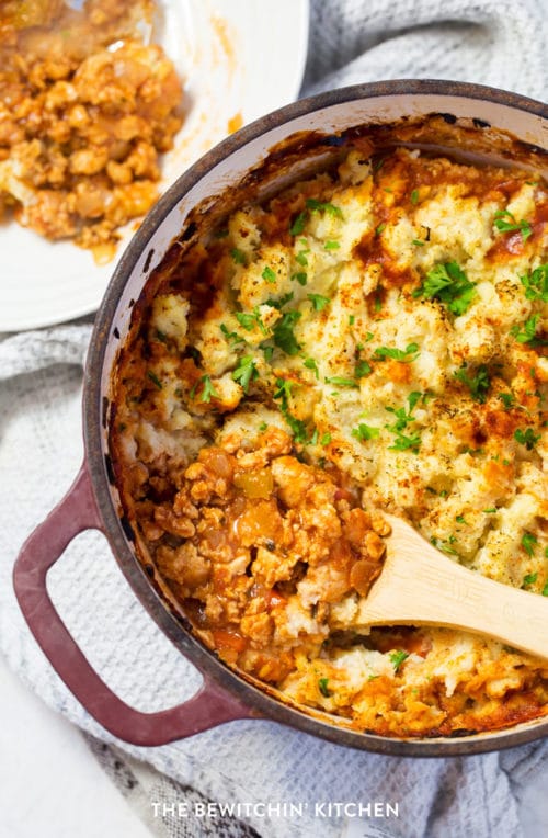 close up of healthy shepherd's pie in a large pot and on a white plate