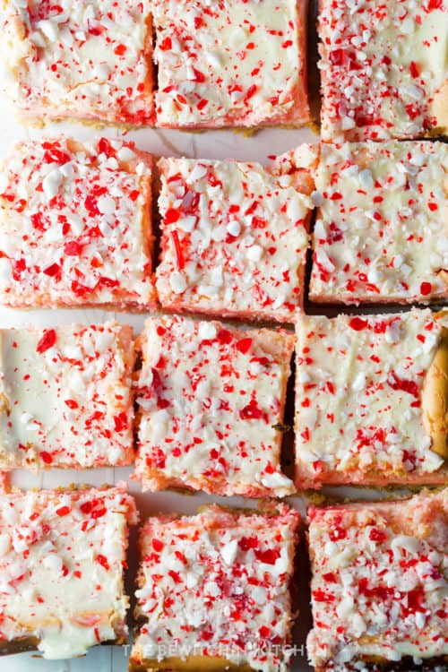 Peppermint white chocolate cheesecake bars cut into squares