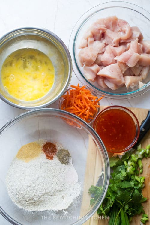 Ingredients to make a thai chili chicken appetizer using gluten free buckwheat flour.