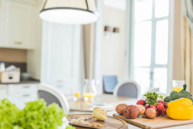 empty kitchen with peeled potatoes