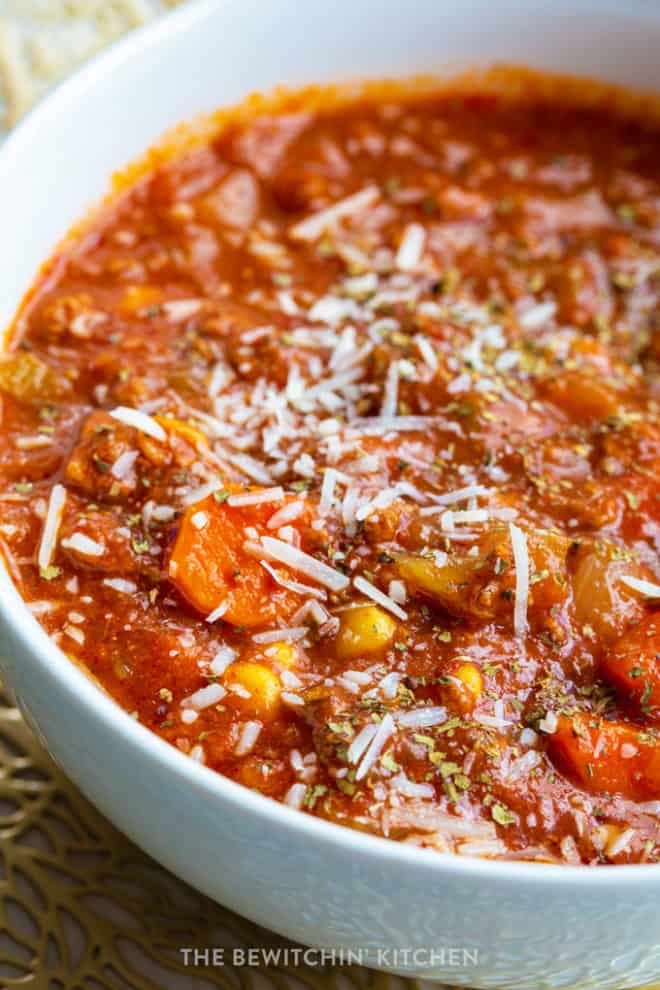 hamburger soup sprinkled with parmesan cheese