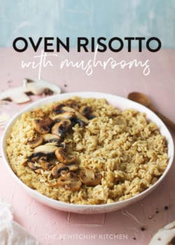 oven risotto with mushrooms in a bowl on a pink background