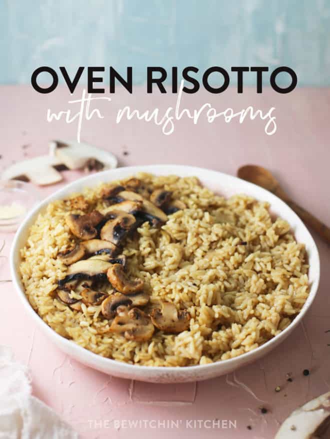 oven risotto with mushrooms in a bowl on a pink background