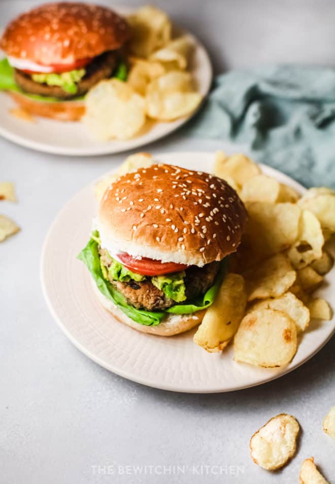 homemade plant based burgers with lettuce and tomato