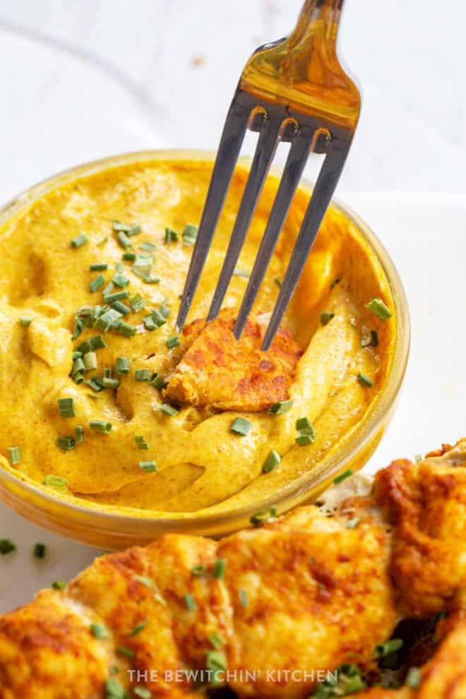 curry mayo dip with a curry chicken piece