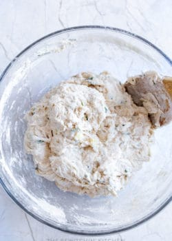 homemade bread ingredients stirred together before rising.