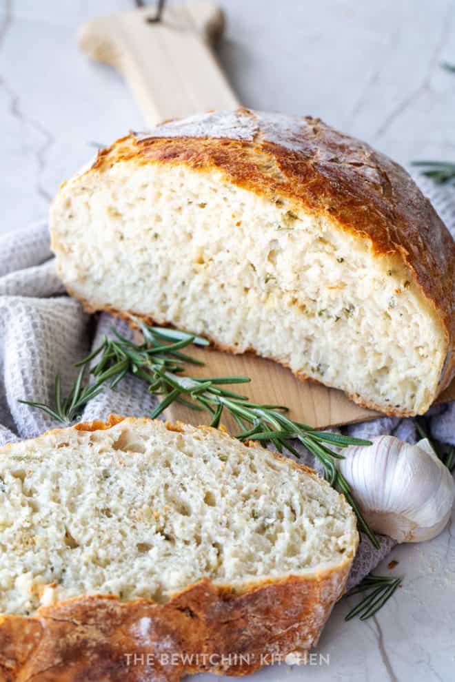 garlic rosemary bread cut and displayed on a table