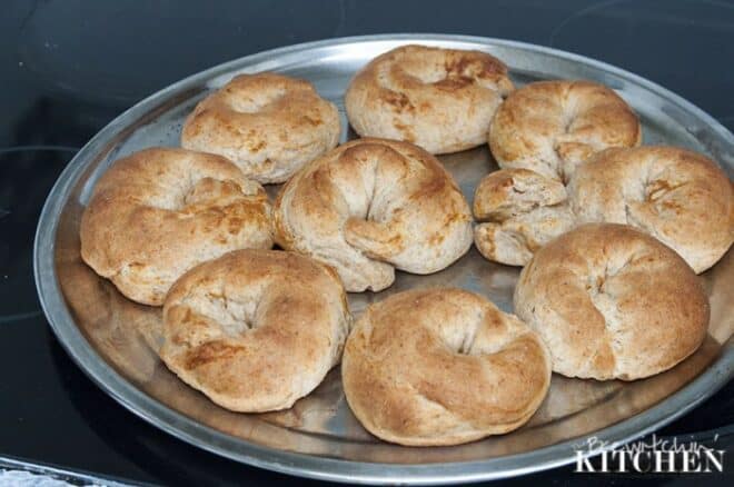 baked donuts on a round silver pan