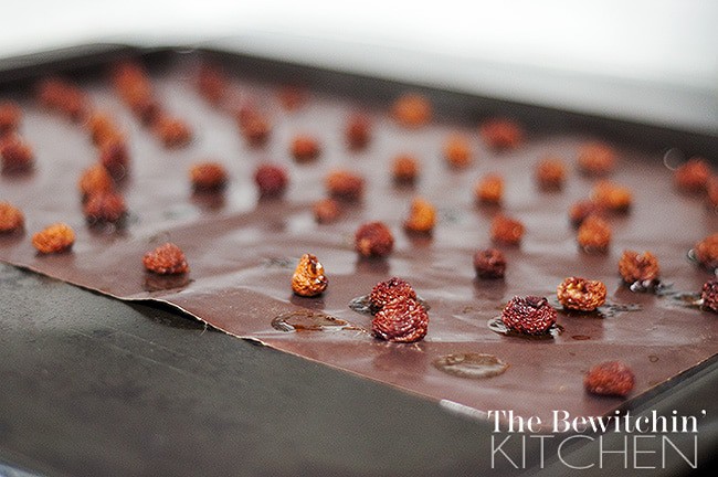 cherries dehydrating on baking sheet