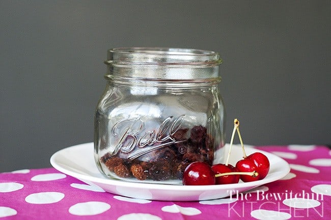 jar of dried tart cherries on a table