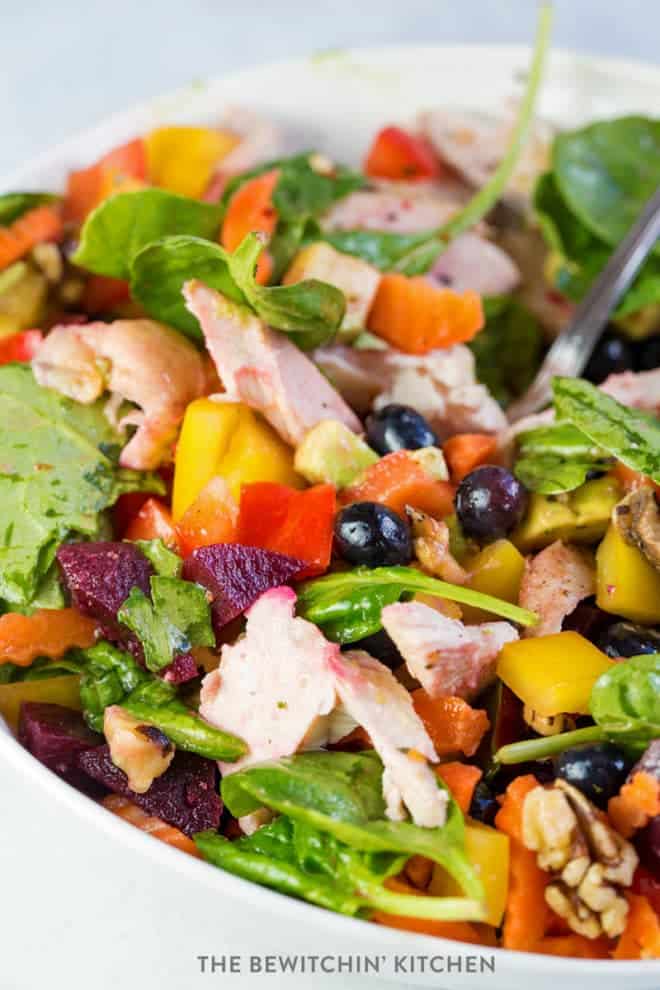 colorful salad with rainbow produce and chicken