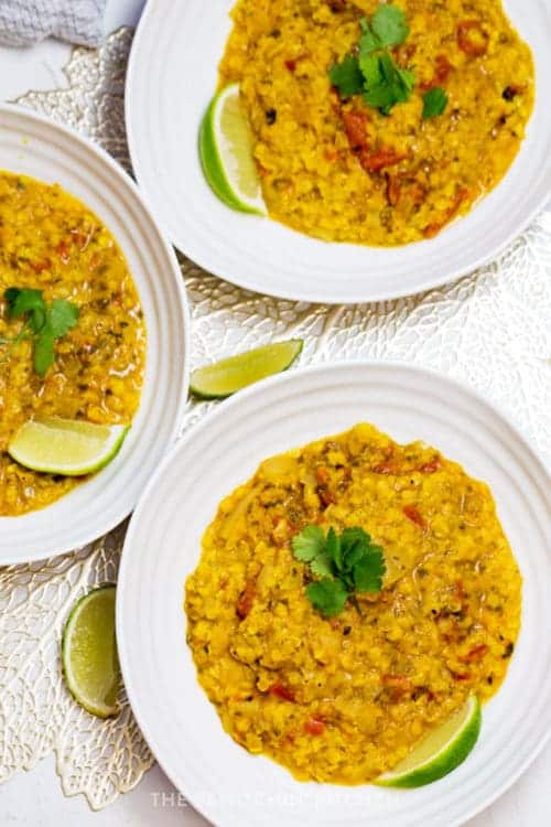 bowls of curry lentil soup with coconut milk
