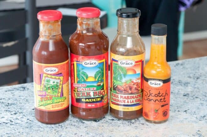 Grace Jerk Dipping Sauce, Jerk BBQ Sauce, Jerk Marinade, and Scotch Bonnet Hot Pepper Sauce used to make Caribbean Jerk Chicken