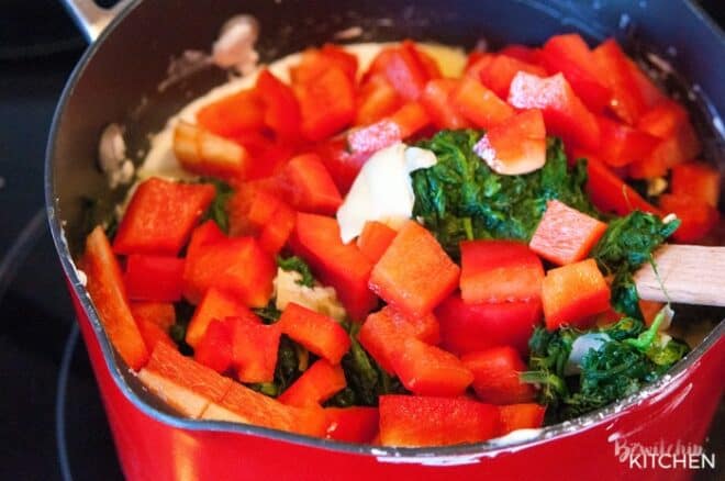 Sauce ingredients for gluten free pasta bake in a saucepan