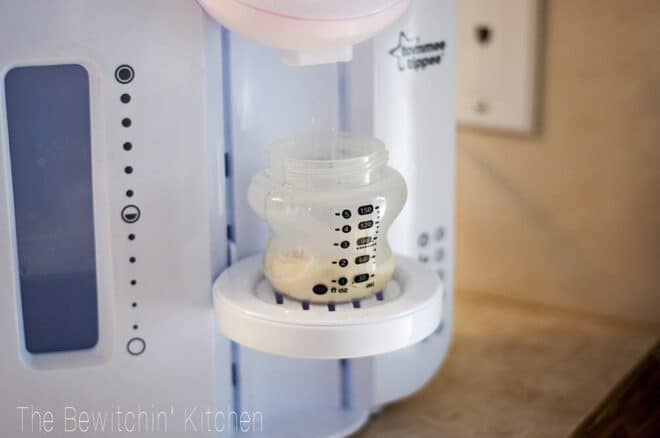 Close up of water being dispensed by the Tommee Tippee bottle maker